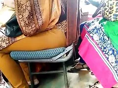 Depraved girls in intercourse with guy on red sofa