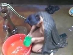 Brunette with a sex toy
